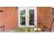Intimate balcony view of chairs and brick exterior at 1822 N Rock Springs Ne Rd # 24, Atlanta, GA 30324