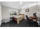 Bedroom featuring natural light, a bed, and desk area at 1822 N Rock Springs Ne Rd # 24, Atlanta, GA 30324