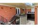 Exterior view showcasing brick facade, outdoor staircases, balconies, and access to units at 1822 N Rock Springs Ne Rd # 24, Atlanta, GA 30324