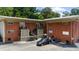 Wide shot of a brick building with parking featuring staircases and unique exterior architecture at 1822 N Rock Springs Ne Rd # 24, Atlanta, GA 30324