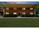 Street view of the building with well-maintained landscaping and classic architectural design at 1822 N Rock Springs Ne Rd # 24, Atlanta, GA 30324