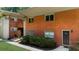 A red brick apartment building featuring well-maintained landscaping and a private entrance at 1822 N Rock Springs Ne Rd # 24, Atlanta, GA 30324