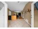 Open kitchen with a tiled floor extends to the living room at 1822 N Rock Springs Ne Rd # 24, Atlanta, GA 30324