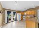 Charming kitchen with tile floors, wood cabinets, appliances, and double doors to the backyard at 1822 N Rock Springs Ne Rd # 24, Atlanta, GA 30324