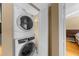 Efficient laundry room featuring a stacked washer and dryer at 1822 N Rock Springs Ne Rd # 24, Atlanta, GA 30324