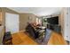 Well-lit living room with hardwood floors, comfortable seating, creating a warm and inviting atmosphere for relaxation at 1822 N Rock Springs Ne Rd # 24, Atlanta, GA 30324