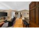 Bright living room with a TV, wood floors, and lots of seating, creating a perfect space for entertaining and relaxing at 1822 N Rock Springs Ne Rd # 24, Atlanta, GA 30324