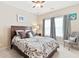 Inviting bedroom with a bed, side table, and window with blinds for adjustable natural light at 50 Cannonade Ct, Covington, GA 30016