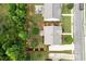 Backyard featuring a fire pit area, beautiful landscaping, and a private wooded border at 236 Creek View Ln, Acworth, GA 30102