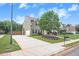 Two-story home with a well-manicured lawn, long driveway, and inviting curb appeal at 236 Creek View Ln, Acworth, GA 30102