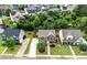 Charming home featuring a well-manicured lawn, mature trees, and a welcoming front porch at 236 Creek View Ln, Acworth, GA 30102
