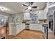 Bright kitchen with white cabinets, stainless steel appliances, and granite countertops at 236 Creek View Ln, Acworth, GA 30102