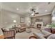 Cozy living room featuring a fireplace, neutral tones, and comfortable seating arrangement at 236 Creek View Ln, Acworth, GA 30102