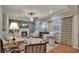 Cozy living room with a fireplace, comfortable seating, and natural light at 236 Creek View Ln, Acworth, GA 30102