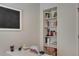 Built-in bookshelves and a floating black board provide additional storage in this office at 236 Creek View Ln, Acworth, GA 30102