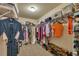 Well-organized walk-in closet, shelves, and hanging rods for ample storage at 236 Creek View Ln, Acworth, GA 30102