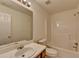 This bathroom features a mirror, vanity, toilet and shower at 2421 Fall Creek Lndg, Loganville, GA 30052