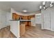 Kitchen with modern appliances and access to a spacious dining area at 2421 Fall Creek Lndg, Loganville, GA 30052