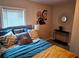 Cozy bedroom featuring a comfortable bed with stylish pillows and decorative wall art at 2977 5Th St, Atlanta, GA 30315