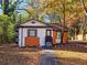 Quaint house boasting a unique facade and beautifully landscaped front yard at 2977 5Th St, Atlanta, GA 30315