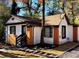 Charming home with dark trim and shutters, a manicured lawn, and inviting curb appeal at 2977 5Th St, Atlanta, GA 30315