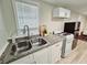 Clean kitchen features stainless steel appliances, granite countertops, and bright natural light at 2977 5Th St, Atlanta, GA 30315