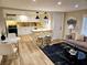 Inviting living space open to kitchen, boasting hardwood floors and contemporary decor, open floor plan at 2977 5Th St, Atlanta, GA 30315