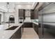 Sleek modern kitchen with stainless steel appliances, including refrigerator, oven, and ample counter space at 40 12Th St # 1004, Atlanta, GA 30309