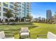 The expansive turf area is perfect for outdoor activities, complemented by city views and relaxing lounge seating at 40 12Th St # 1004, Atlanta, GA 30309