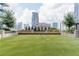 Enjoy the expansive turf area with cityscape views, perfect for relaxing or recreational activities at 40 12Th St # 1004, Atlanta, GA 30309