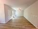 Spacious living room with wood floors, lots of light and ceiling fan at 66 Pine Creek Ct, Dallas, GA 30157