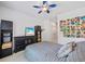 Bedroom with decorative pictures on wall at 1005 Renfroe Lake Dr, Auburn, GA 30011