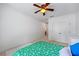 Bedroom featuring a ceiling fan, white trim, and carpet at 1005 Renfroe Lake Dr, Auburn, GA 30011