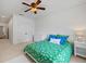 Bedroom with carpet and a green comforter at 1005 Renfroe Lake Dr, Auburn, GA 30011