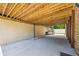 This attached carport showcases its ample parking space and provides convenient access at 1005 Renfroe Lake Dr, Auburn, GA 30011