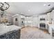 Bright eat-in kitchen with an island, stainless steel appliances, and white cabinets at 1005 Renfroe Lake Dr, Auburn, GA 30011