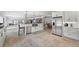 Contemporary kitchen featuring a large island, stainless steel appliances, and an open layout at 1005 Renfroe Lake Dr, Auburn, GA 30011