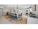 Open-concept kitchen with an island, stainless steel appliances, and ample counter space at 1005 Renfroe Lake Dr, Auburn, GA 30011
