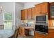Cozy breakfast nook showcases a built-in desk area and is adjacent to a well-appointed kitchen at 1005 Renfroe Lake Dr, Auburn, GA 30011