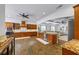 Expansive kitchen features granite counters, custom cabinetry, and a center island perfect for cooking and entertaining at 1005 Renfroe Lake Dr, Auburn, GA 30011