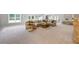 Spacious living room with large sectional, neutral decor and lots of natural light at 1005 Renfroe Lake Dr, Auburn, GA 30011