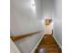 Staircase with wood treads, leading to a finished basement with office space at 1005 Renfroe Lake Dr, Auburn, GA 30011
