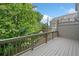 Outdoor deck overlooking lush greenery and neighboring houses at 2801 Avington Se Ln, Smyrna, GA 30080