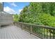 Wood deck overlooking a backyard with lots of trees at 2801 Avington Se Ln, Smyrna, GA 30080