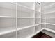 Spacious walk-in pantry with ample shelving for organized storage at 2801 Avington Se Ln, Smyrna, GA 30080