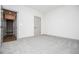 A light filled bedroom with neutral decor and carpet at 5525 Belle Meade Dr, Villa Rica, GA 30180