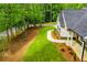 The exterior of the home features a lush green lawn and a paved walkway to the front door at 5525 Belle Meade Dr, Villa Rica, GA 30180