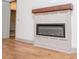 Living room fireplace with modern mantle and neutral color scheme at 5525 Belle Meade Dr, Villa Rica, GA 30180