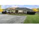 Exterior of a community recreation center with covered patio and well-maintained landscaping at 5525 Belle Meade Dr, Villa Rica, GA 30180