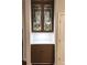 Butler's pantry with glass-front cabinets, a countertop, and ample storage space at 850 Piedmont Ne Ave # 1206, Atlanta, GA 30308